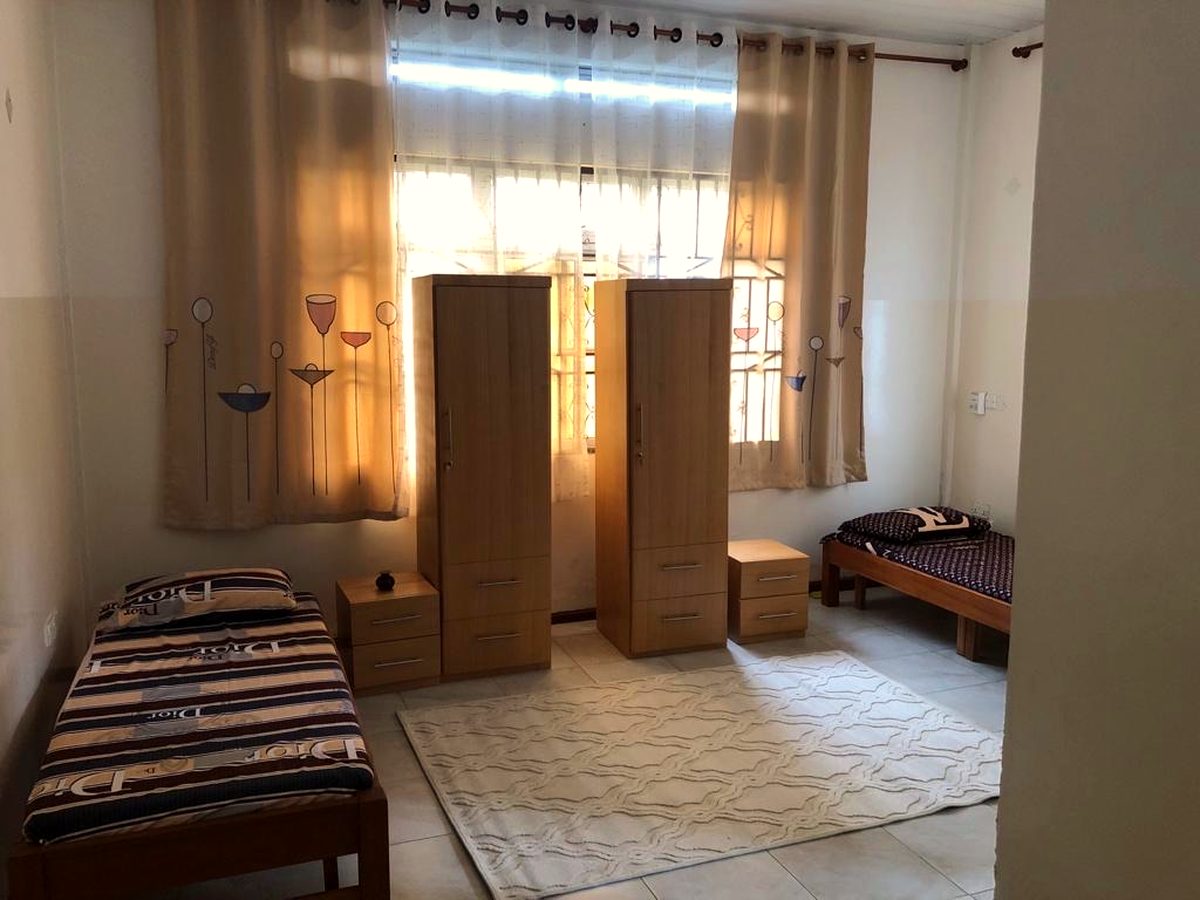 One of the seven bedrooms in the shared apartment