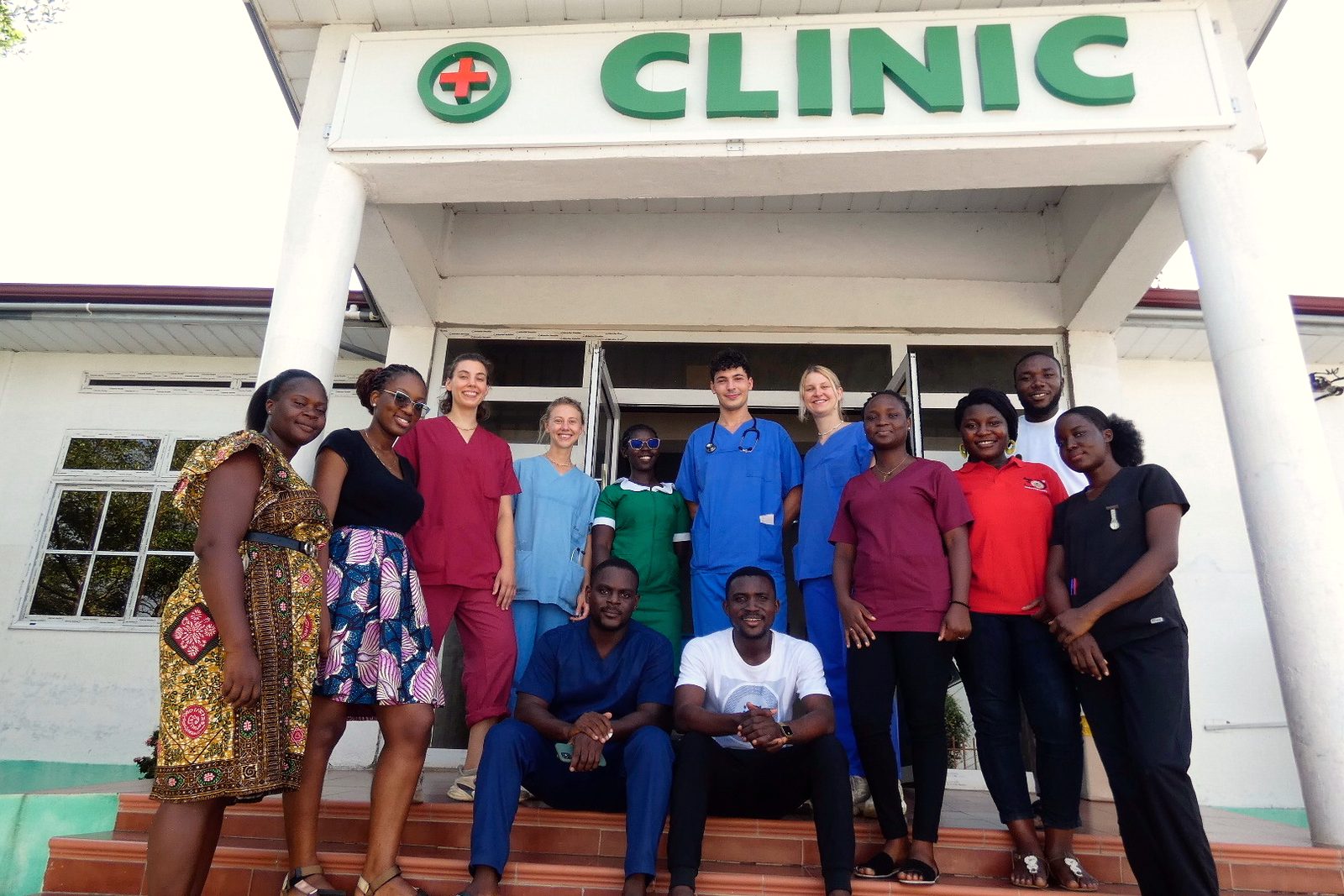 The MedXchange Africa team and visiting students gathered together in front of the clinic in Cape Coast
